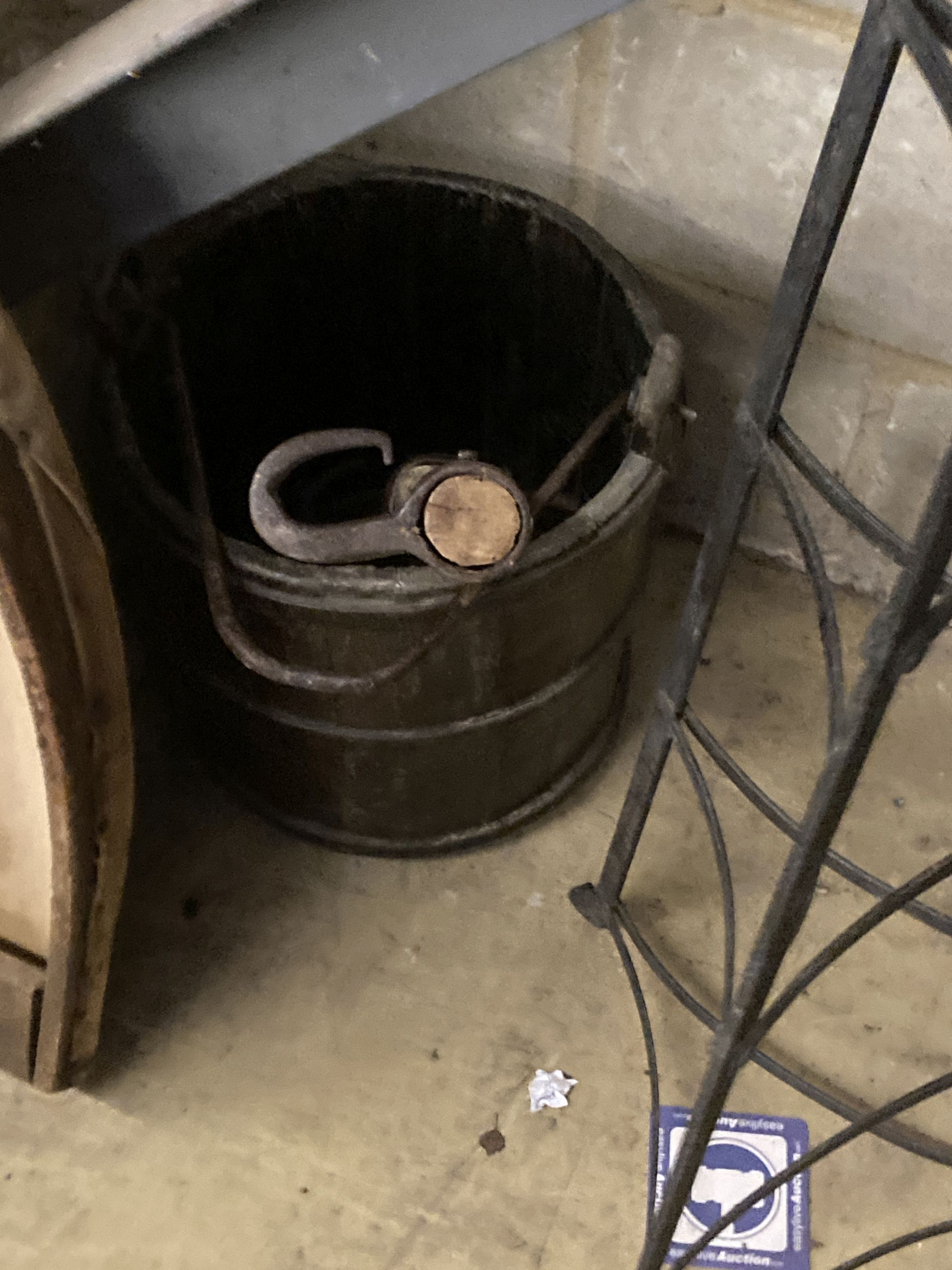 A Victorian mulch shovel, wrought iron pot stand and a yoke